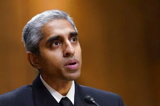 Surgeon General Dr. Vivek Murthy testifies before the Senate Finance Committee on Capitol Hill in Washington, Tuesday, Feb. 8, 2022, on youth mental health care. (AP Photo/Susan Walsh)