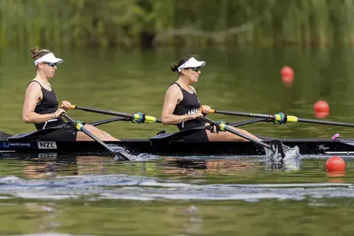 Brooke Francis, left, and Lucy Spoors of New Zealand compete in the Women's Double Sculls semi final on the second day of the 2024 World Rowing Cup at Rotsee, in Lucerne, Switzerland, Saturday, May 25, 2024. (Philipp Schmidli/Keystone via AP, File)