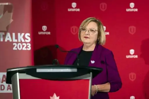 Lana Payne, Unifor national president speaks during a news conference, Aug. 29, 2023, in Toronto. Auto workers walked off the job at three General Motors facilities in Canada early Tuesday, Oct. 10, 2023 after failing to reach agreement with the automaker. (Tijana Martin/The Canadian Press via AP, File)