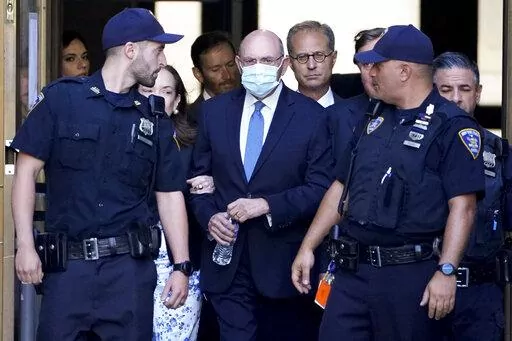 Trump Organization's former Chief Financial Officer Allen Weisselberg, center, leaves court, Thursday, Aug. 18, 2022, in New York. Weisselberg pled guilty on Thursday to tax violations in a deal that would require him to testify about business practices at the former president's company. (AP Photo/John Minchillo)