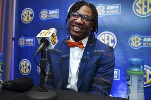 Florida quarterback Anthony Richardson speaks during NCAA college football Southeastern Conference Media Days, Wednesday, July 20, 2022, in Atlanta. (AP Photo/John Bazemore)