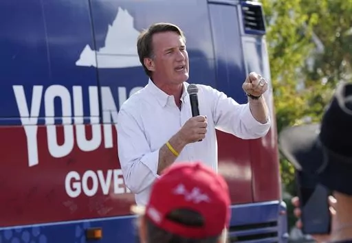 Virginia Gov. Glenn Youngkin addresses the crowd during an early voting rally Sept. 21, 2023, in Petersburg, Va. (AP Photo/Steve Helber, File)