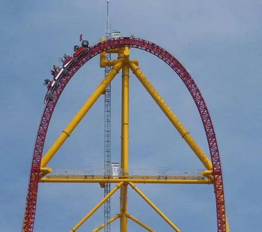Riders on the Top Thrill Dragster speed along on May 1, 2003, at Cedar Point Amusement Park, in Sandusky, Ohio. The amusement park in Ohio is permanently closing the world’s second-tallest roller coaster. The decision announced Tuesday, Sept. 6, 2022, by Cedar Point comes a year after a small metal object flew off the 420-foot (128-meter) tall Top Thrill Dragster coaster and struck a woman in the head at the park in Sandusky. (AP Photo/Paul M. Walsh, File)