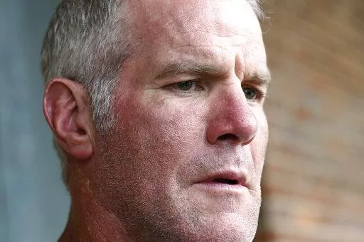 Former NFL quarterback Brett Favre speaks to the media in Jackson, Miss., Oct. 17, 2018. Favre's lawyers filed papers Friday, Feb. 10, 2023, again asking a Mississippi judge to dismiss the retired NFL quarterback from a lawsuit that demands repayment of millions of dollars of welfare money intended to help some of the poorest people in the U.S. (AP Photo/Rogelio V. Solis, File)
