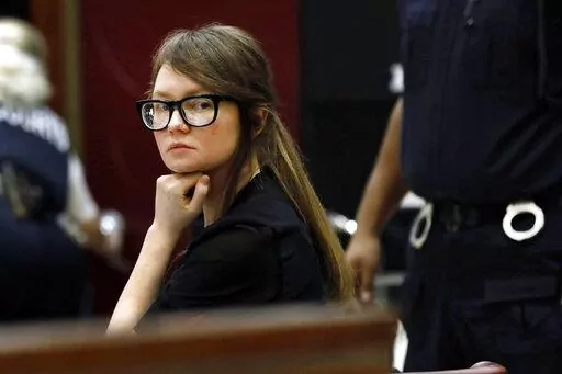 FILE — Anna Sorokin sits at the defense table during jury deliberations in her trial at New York State Supreme Court, April 25, 2019, in New York. Sorokin, whose exploits inspired a Netflix series, has been released from immigration custody into home confinement, a spokesperson said Saturday, Oct. 8, 2022.  (AP Photo/Richard Drew, File)