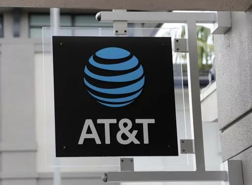 The sign in front of an AT&T retail store is seen in Miami, July 18, 2019. The theft of sensitive information belonging to millions of AT&T’s current and former customers has been recently discovered online, the telecommunications giant said Saturday, March 30, 2024. In an announcement addressing the data breach, AT&T said that a dataset found on the dark web contains information including some Social Security numbers and passcodes for about 7.6 million current account holders and 65.4 million
