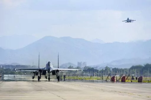 In this photo released by China's Xinhua News Agency, air force and naval aviation corps of the Eastern Theater Command of the Chinese People's Liberation Army (PLA) fly planes at an unspecified location in China, Aug. 4, 2022. The Chinese air force is sending fighter jets and bombers to Thailand for a joint exercise with the Thai military on Sunday, Aug. 14, 2022. (Fu Gan/Xinhua via AP, File)