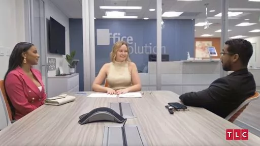 This image released by TLC shows Chantel Everett, left, and Pedro Jimeno, right, with a realtor in a scene from the reality series "The Family Chantel." (TLC via AP)