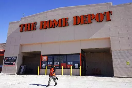 A view of the exterior of the Home Depot improvement store, in Niles, Ill., Saturday, Feb. 19, 2022. Home Depot says it’s investing $1 billion in wage increases for its U.S. and Canadian hourly workers. The Atlanta-based home improvement chain said Tuesday, Feb. 21, 2023 that every hourly employee will get a raise starting this month. The investment will also ensure that starting pay is at least $15 per hour in all markets. (AP Photo/Nam Y. Huh, File)