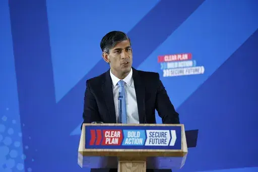 Britain's Prime Minister and Conservative Party leader, Rishi Sunak, delivers a speech to launch the Conservatives' general election manifesto in Silverstone, England, on Tuesday June 11, 2024, in the build-up to the UK general election on July 4. (Benjamin Cremel, Pool Photo via AP)