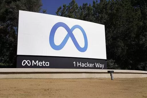 Facebook's Meta logo sign is seen at the company headquarters in Menlo Park, Calif., on, Oct. 28, 2021. A federal judge has ruled, Tuesday, Jan. 11, 2022, that the Federal Trade Commission’s revised antitrust suit against Meta, formerly known as Facebook, can proceed, shutting down the social media company’s request for a dismissal. (AP Photo/Tony Avelar, File)