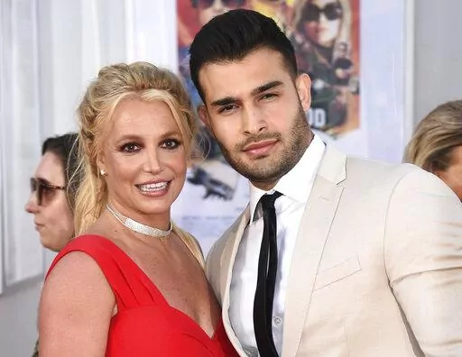 Britney Spears and Sam Asghari appear at the Los Angeles premiere of "Once Upon a Time in Hollywood" on July 22, 2019. Spears has married her longtime partner Sam Asghari at a Southern California ceremony that came months after the pop superstar won her freedom from a court conservatorship. Asghari’s representative Brandon Cohen confirmed the couple’s nuptials. (Photo by Jordan Strauss/Invision/AP, File)