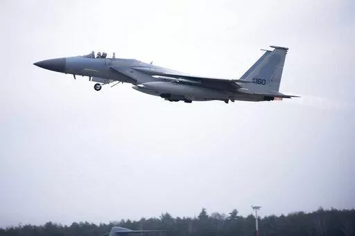 In this image provided by the U.S. Air Force, a U.S. Air Force F-15C Eagle assigned to the 493rd Fighter Squadron, Royal Air Force (RAF) Lakenheath, takes off in support of North Atlantic Treaty Organization enhanced air policing missions with the Polish Air Force at Lask Air Base, Poland, Feb. 15, 2022. Russia's attack on Ukraine's Zaporizhzhia nuclear power plant has renewed calls for NATO to impose a no-fly zone over Ukraine, despite the repeated rejection of the idea by western leaders conce