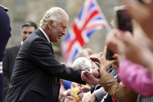 Britain's King Charles III meets members of the public during his visit to Kinneil House in Edinburgh, Scotland, Monday, July 3, 2023. At an age when many of his contemporaries have long since retired, King Charles III is not one to put his feet up. The king will mark his 75th birthday on Tuesday, Nov. 14, 2023, by highlighting causes close to his heart. With Queen Camilla at his side, Charles will visit a project that helps feed those in need by redistributing food that might otherwise go to la