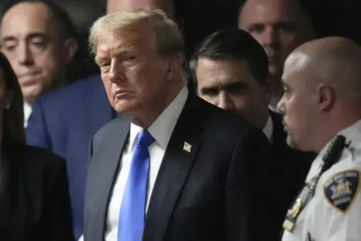 Former President Donald Trump walks out of the courtroom to make comments to members of the media after a jury convicted him of felony crimes for falsifying business records in a scheme to illegally influence the 2016 election, at Manhattan Criminal Court, May 30, 2024, in New York. Trump is scheduled to be interviewed by New York probation officials. The interview Monday, June 10, is a required step before his July sentencing. Three people familiar with the plan say Trump will do the interview 